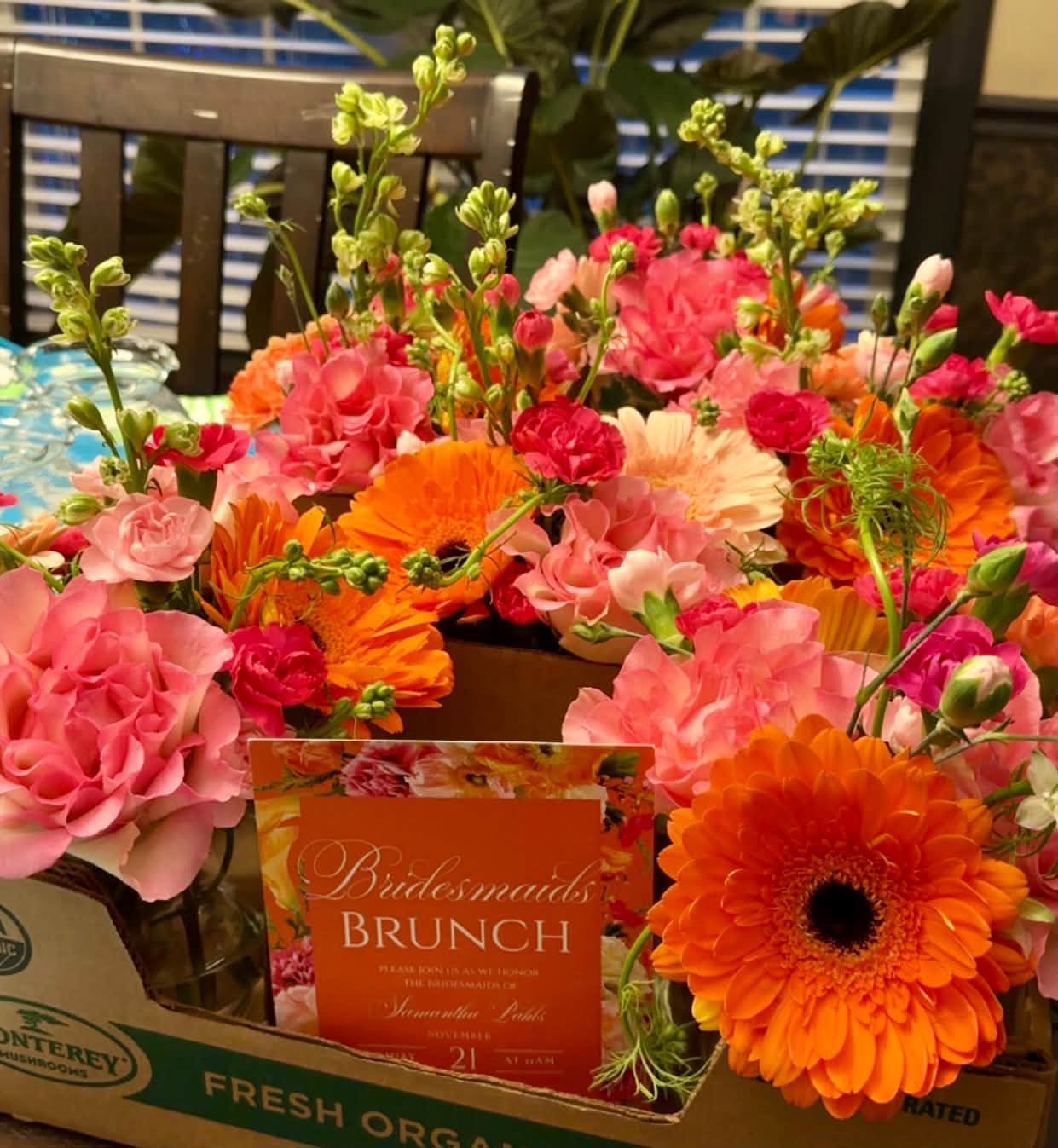 Abundant pink and orange floral arrangements